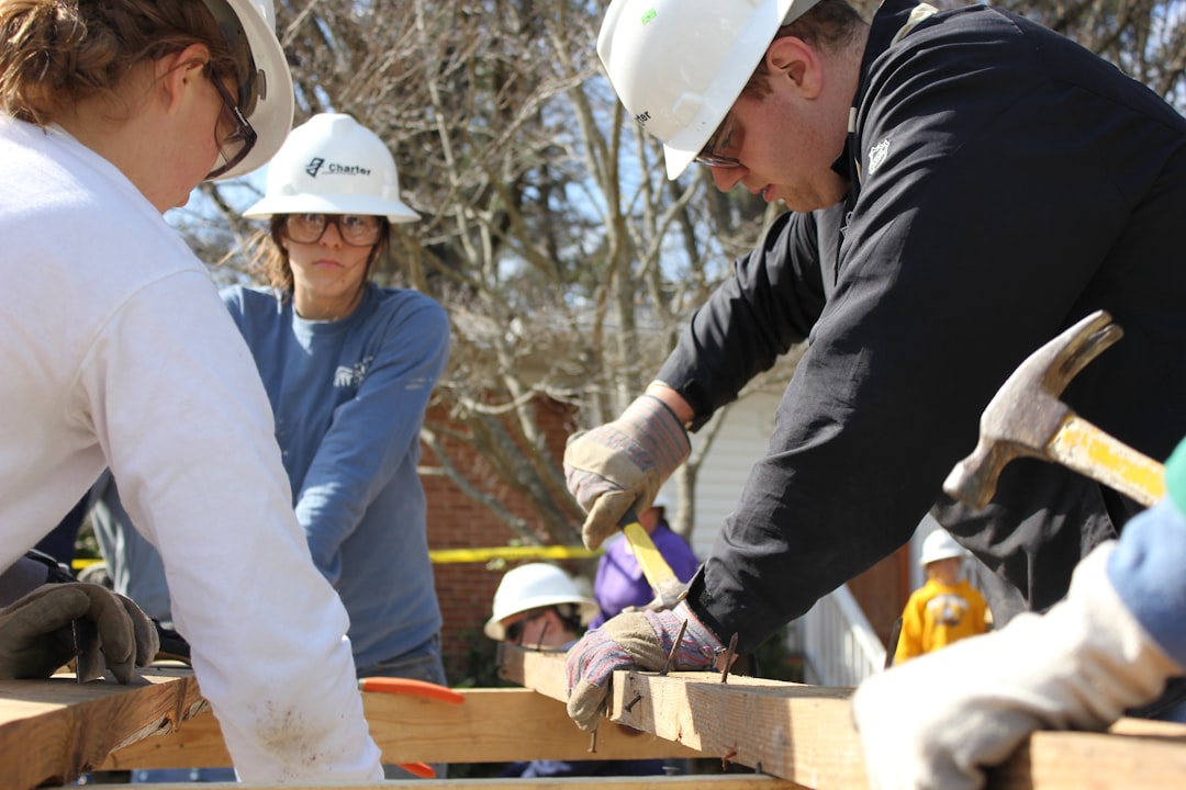 services-01 Habitat for Humanity project with undergraduate students working during spring break.